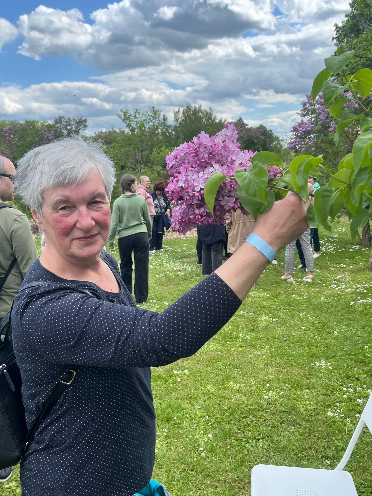 grannie holding flower