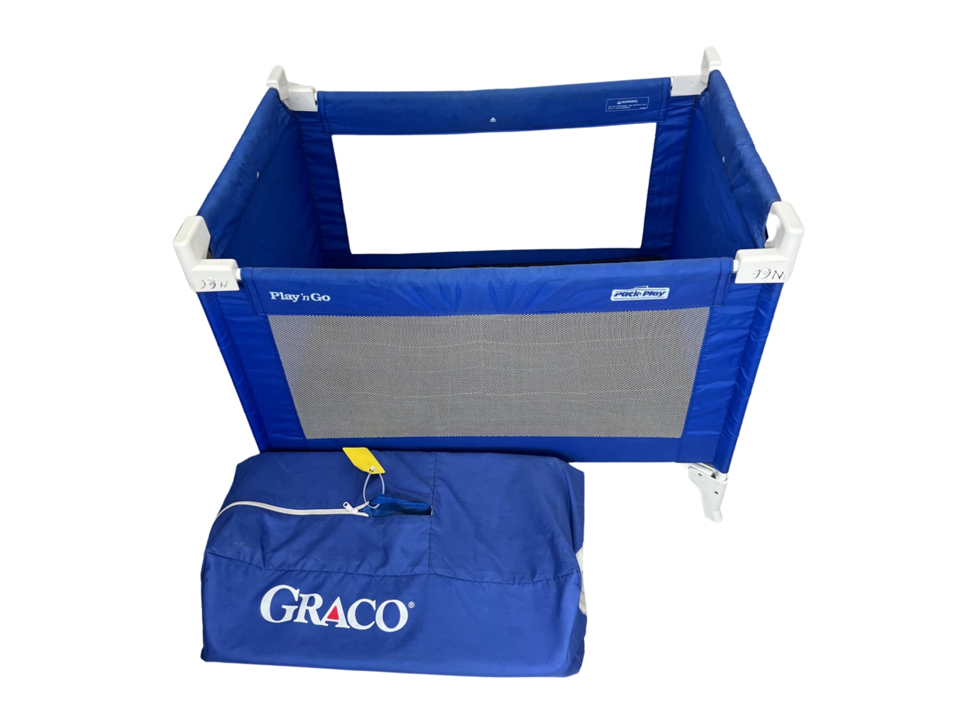 A portable playard featuring mesh sides, a foldable metal frame, and an integrated bassinet attachment, branded “Pack ’N Play.”