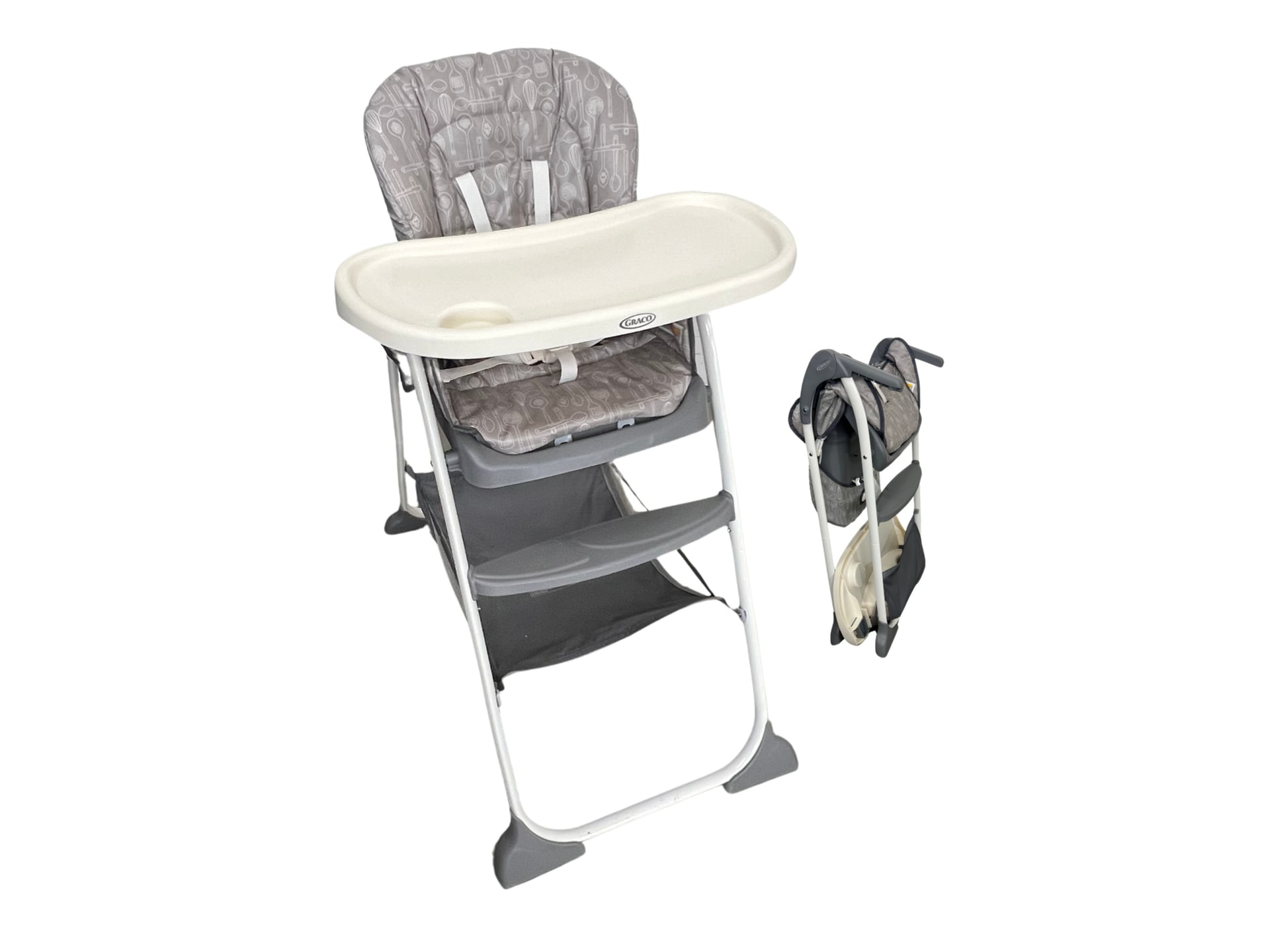 A child’s feeding high chair with a molded plastic seat and removable tray, adjustable-height legs, and a safety harness to secure the child in place.