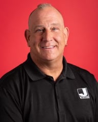 Portrait of Andrew Slazenik, Superintendent at Jewett Construction, featured in a Q&A spotlight.