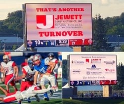 Game-day photo montage including scoreboard, field action, and sponsor signage showing Jewett Construction’s support for CHaD’s fundraising event.