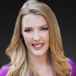 Professional headshot of Kat Howland, newly hired as Marketing Manager at Jewett Construction.