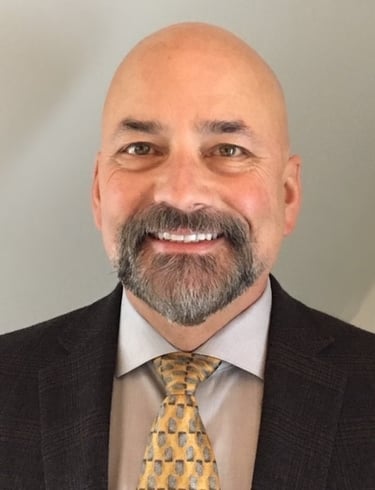 Professional headshot of Myles Cambridge, new Vice President of New Hampshire Operations