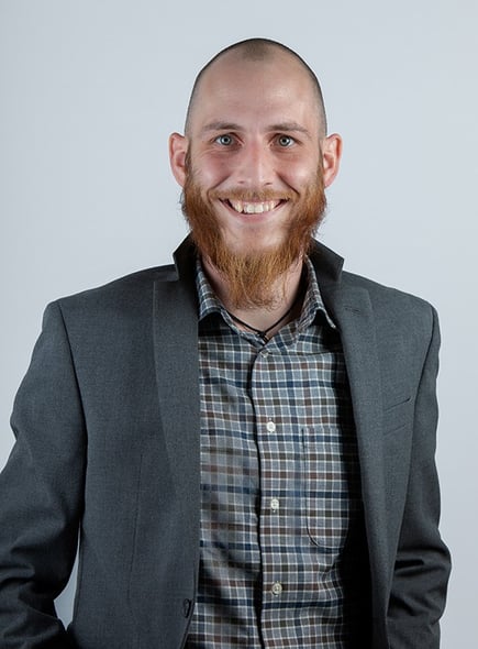 Portrait of Eric Woodmansee, Assistant Project Manager at Jewett Construction.