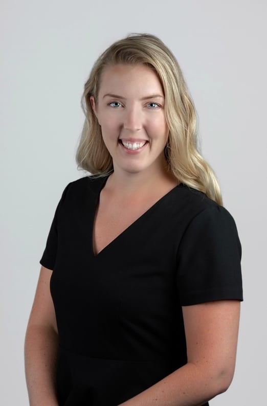 Professional headshot of Kat Howland, promoted to Director of Marketing at Jewett Construction